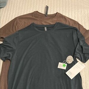 Lot of 2 Vuori shirts. One current tech tee and one strato tech